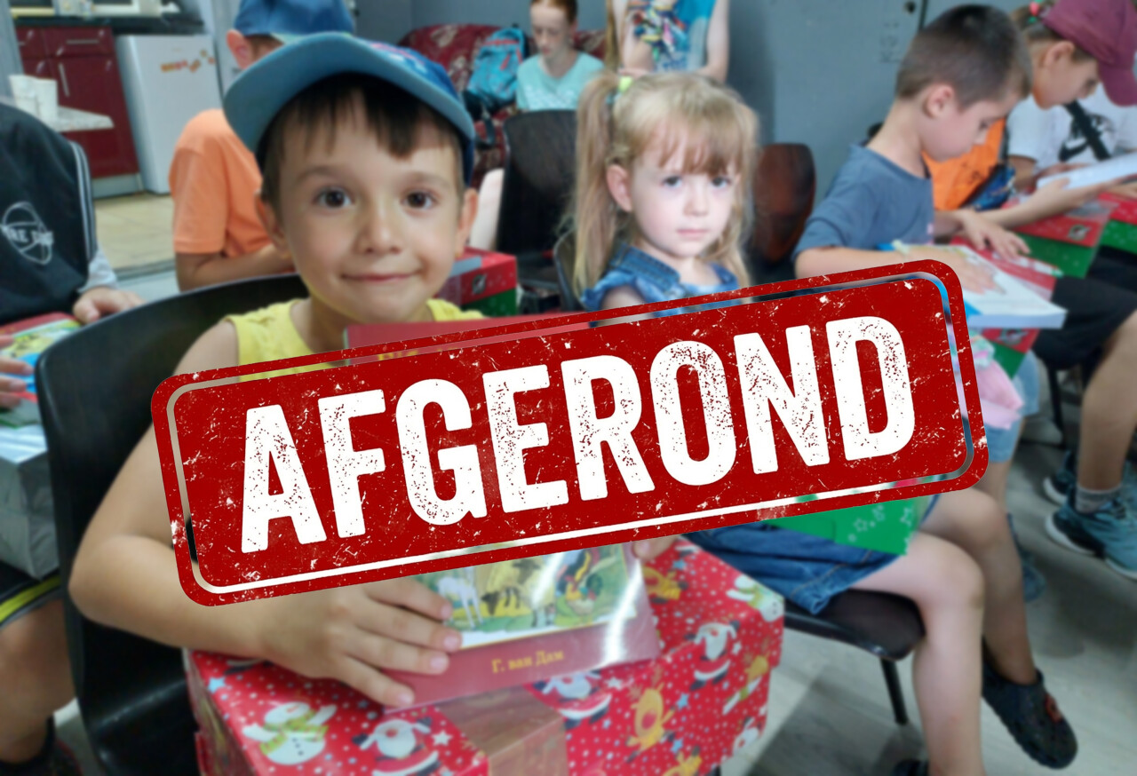 Foto van kinderen met Bijbelse vertellingen - stempel 'Afgerond'